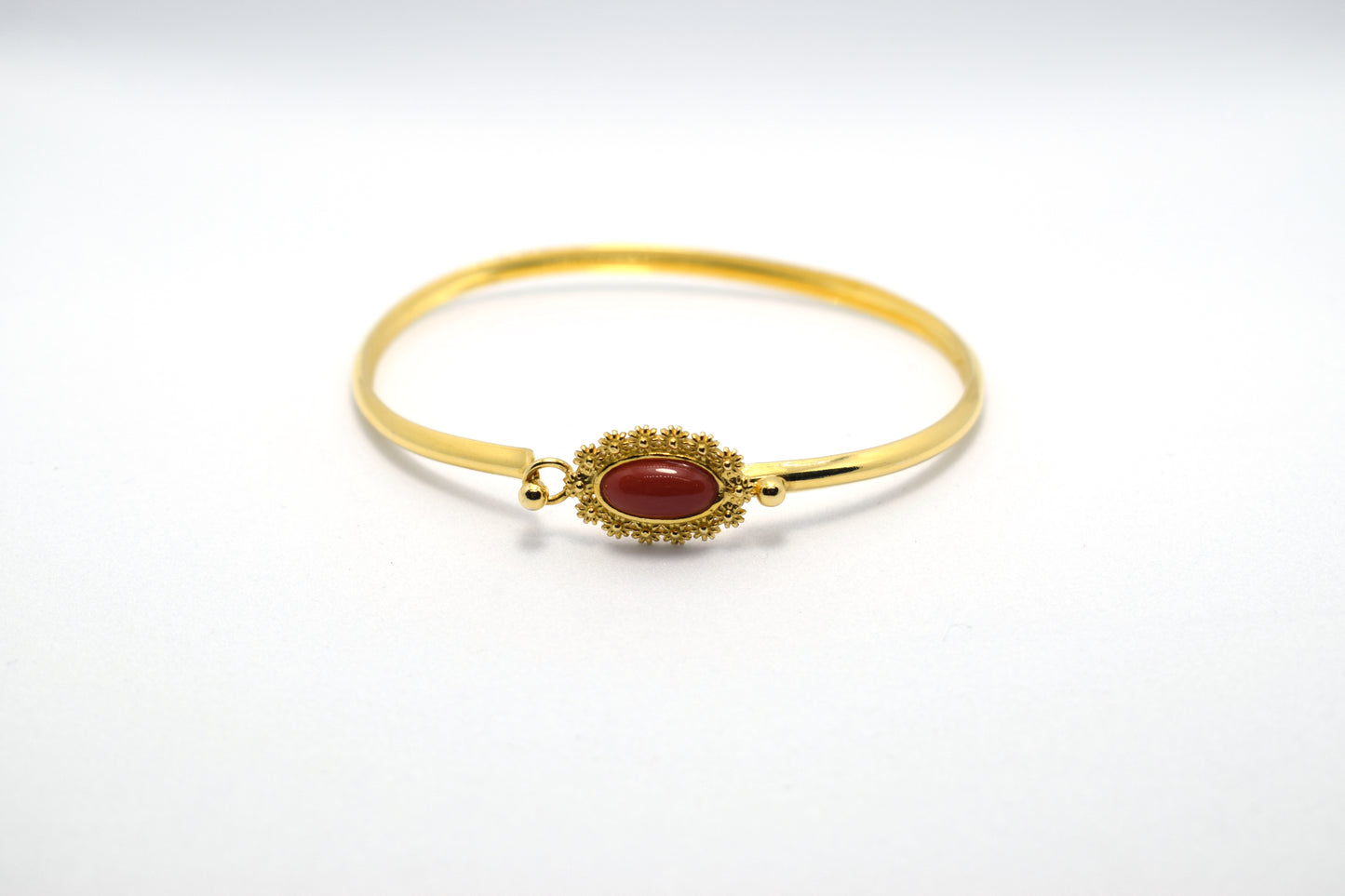 Bracciale Corallo Dorato: Essenza di Mare